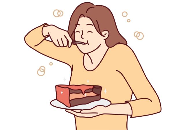 ケーキを食べている女性